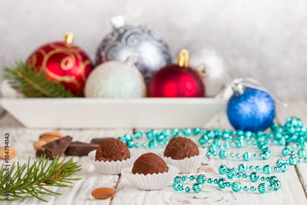 Truffles of dark chocolate with cocoa powder. Homemade candy. Dessert for gourmets. New year, Christmas. Selective focus Truffles of dark chocolate with cocoa powder. Homemade candy. Dessert for gourmets. New year, Christmas. Selective focus