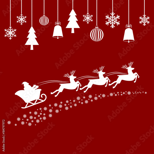 Santa flying in a sleigh with reindeer photo