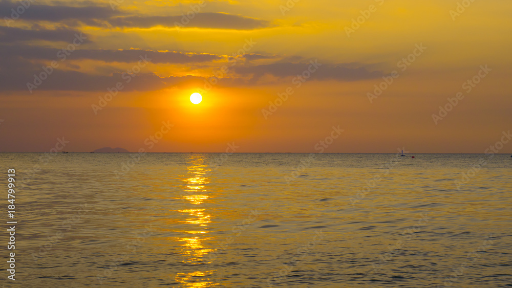 Sunset with golden sky and ocean. Sunset with golden sky and ocean.