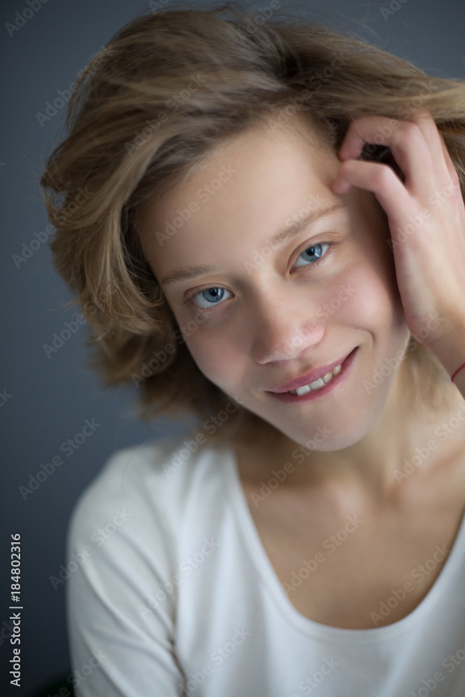 Portrait of beautiful woman dreamily looking in camera while biting her lip isolated Portrait of beautiful woman dreamily looking in camera while biting her lip isolated