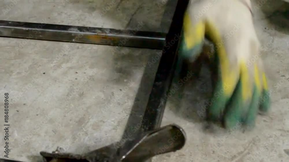 Worker,welding in a car  with sparks, manufacturing, industry
