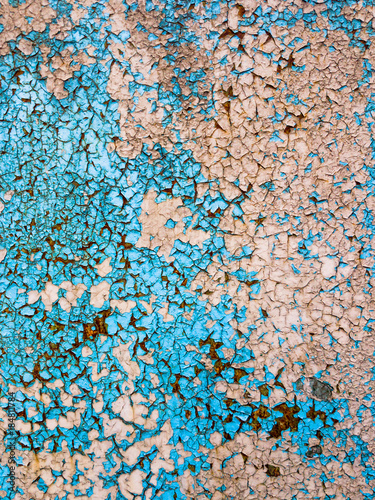 Stained metal with peeling paint / Sheet of rusted, stained metal with peeling paint as pattern for backgrounds 