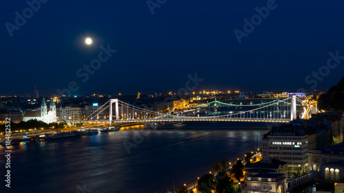 Moon over the bridge in Budapest © Jaroslav