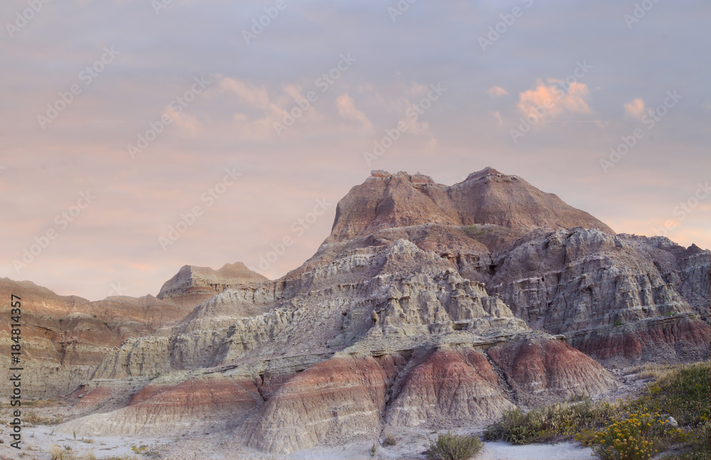 The Eroded Mountains of the Badlands at Sunset