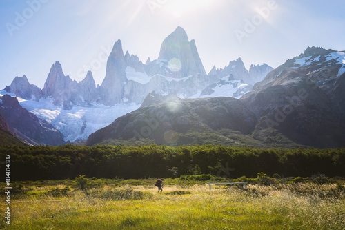 Young female is hiking under Fitz Roy in Los Glaciares National Park in Patagonia, Argentina