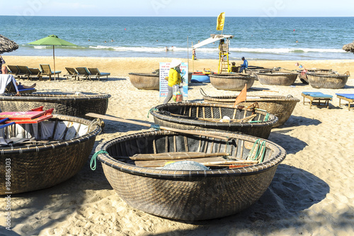 traditional circular boats in the beach of An Bang in the Hoi an town in Vietnam.