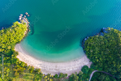 Fototapeta Naklejka Na Ścianę i Meble -  Aerial top view of scenic tropical beach with beautiful sunlight