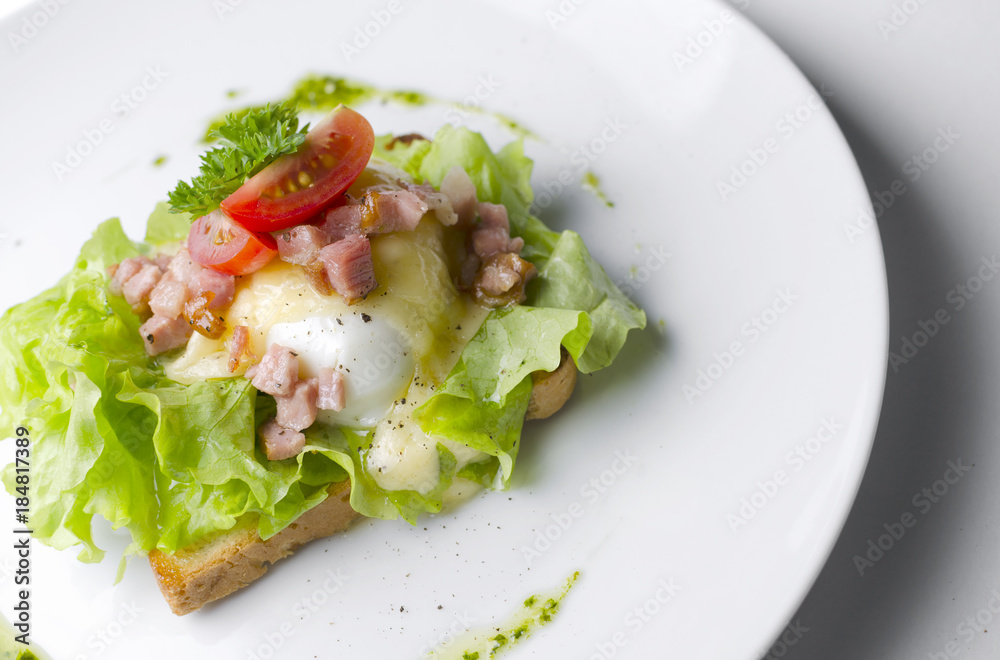 Sandwich with poached egg and bacon Sandwich with poached egg and bacon