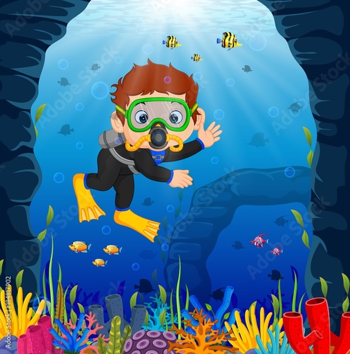 Cartoon boy diving in the sea