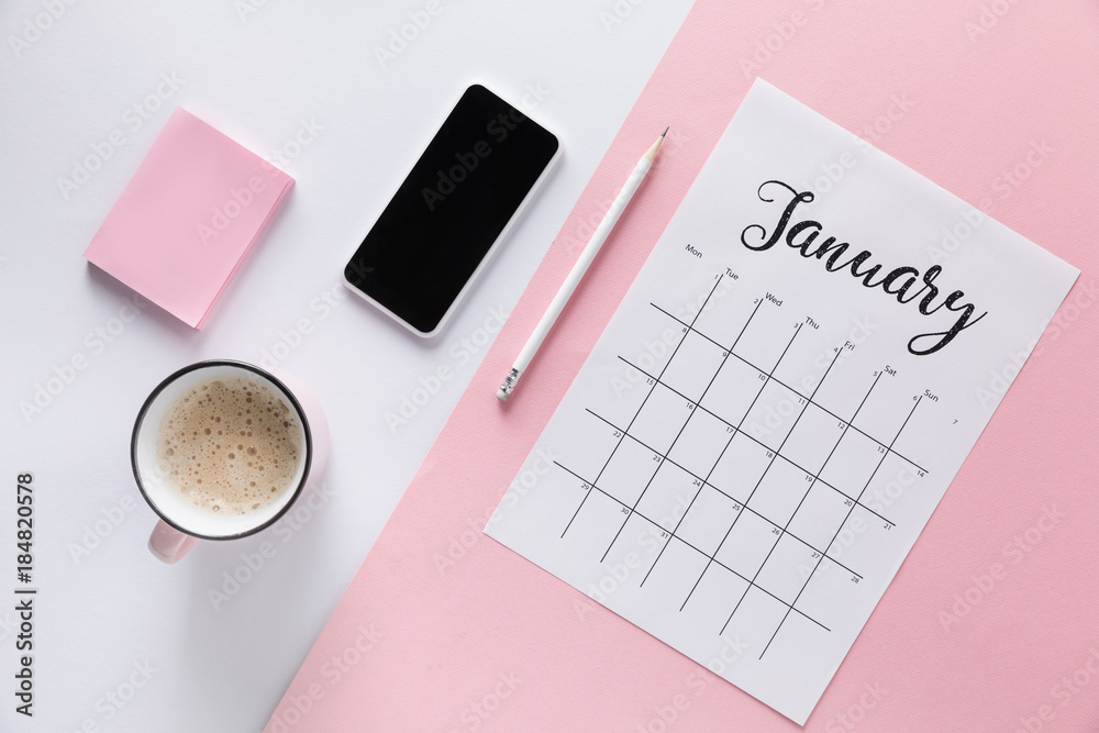 flat lay with calendar, smartphone, cup of coffee and blank sticky notes flat lay with calendar, smartphone, cup of coffee and blank sticky notes
