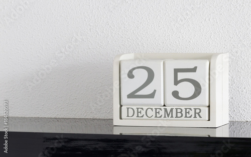 White block calendar present date 25 and month December