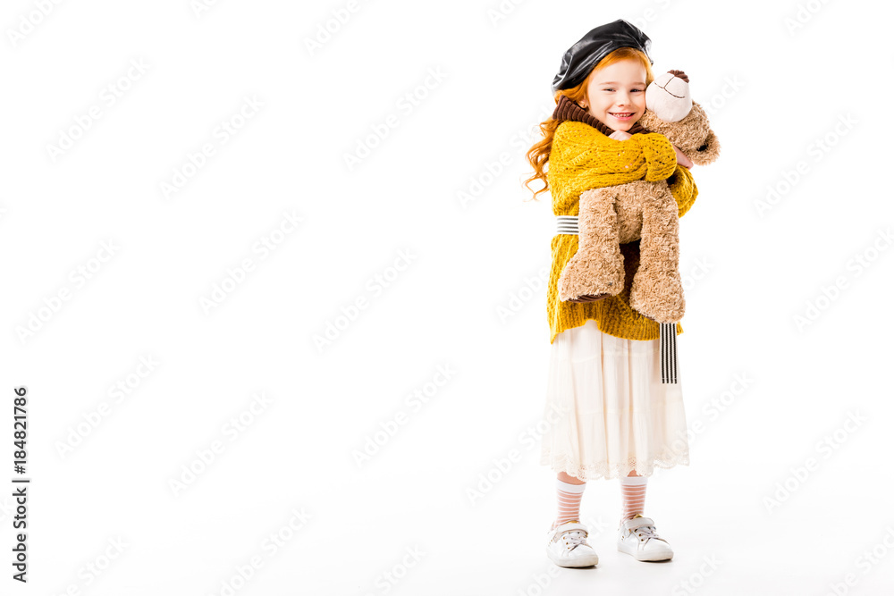 smiling red hair child hugging teddy bear isolated on white smiling red hair child hugging teddy bear isolated on white