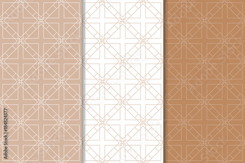 Brown and white geometric ornaments. Set of seamless patterns