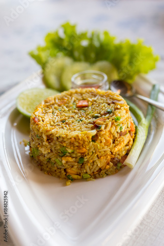 Tableau sur toile Curry Fried Rice, Stir-fried with egg, onions, green peas, carrots and seasoned with curry powder