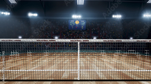 Empty professional volleyball court in lights