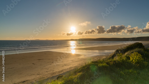 Evening sun over Newgale Beach  Pembrokeshire  Dyfed  Wales  UK