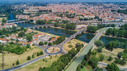Aerial top view of Beziers town  river and bridges from above  South France  