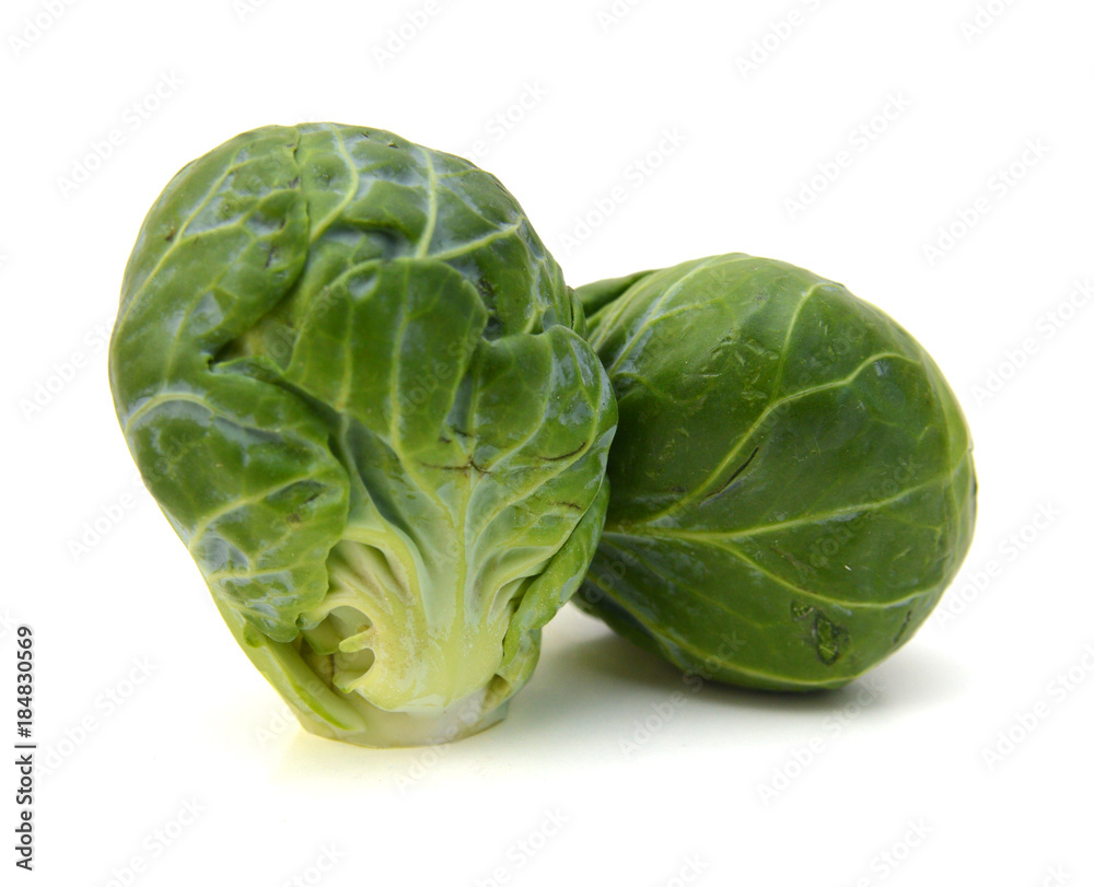 a pile of Brussels sprouts on a white background a pile of Brussels sprouts on a white background