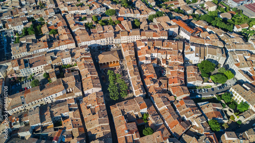 Aerial top view of residential area houses roofs and streets from above, old medieval town background, France 