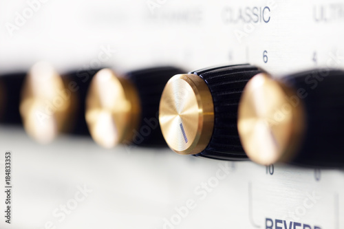 close up knob volume of electric guitar amplifier
