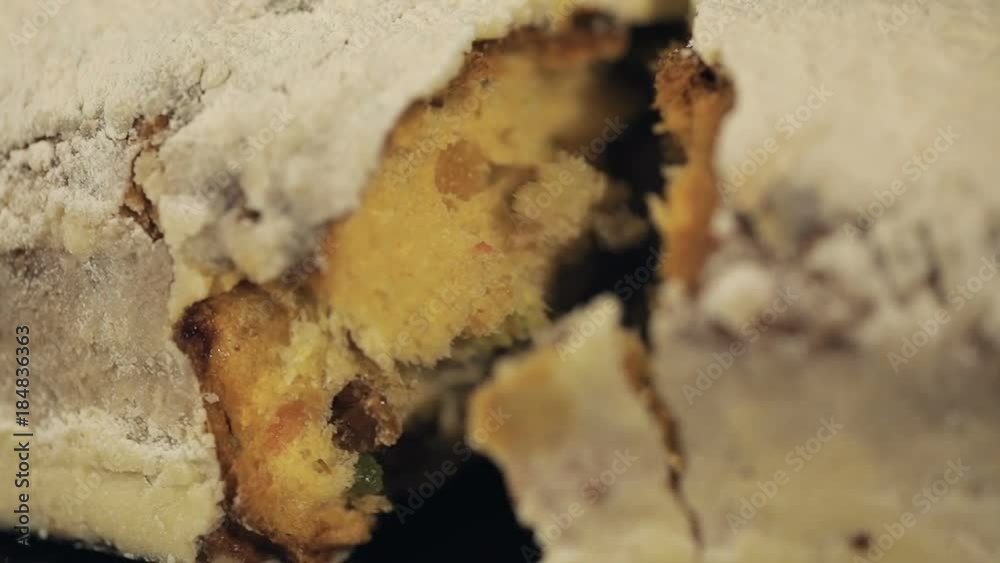 Breaking Christmas Stollen in half. Slow motion Breaking Christmas Stollen in half. Slow motion