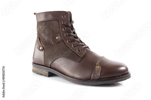 Male brown leather boot on white background, isolated product, comfortable footwear. © GeorgeVieiraSilva