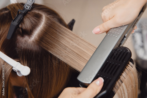 Keratin recovery hair and protein treatment pile with professional ultrasonic iron tool. Concept lamination, lifting
