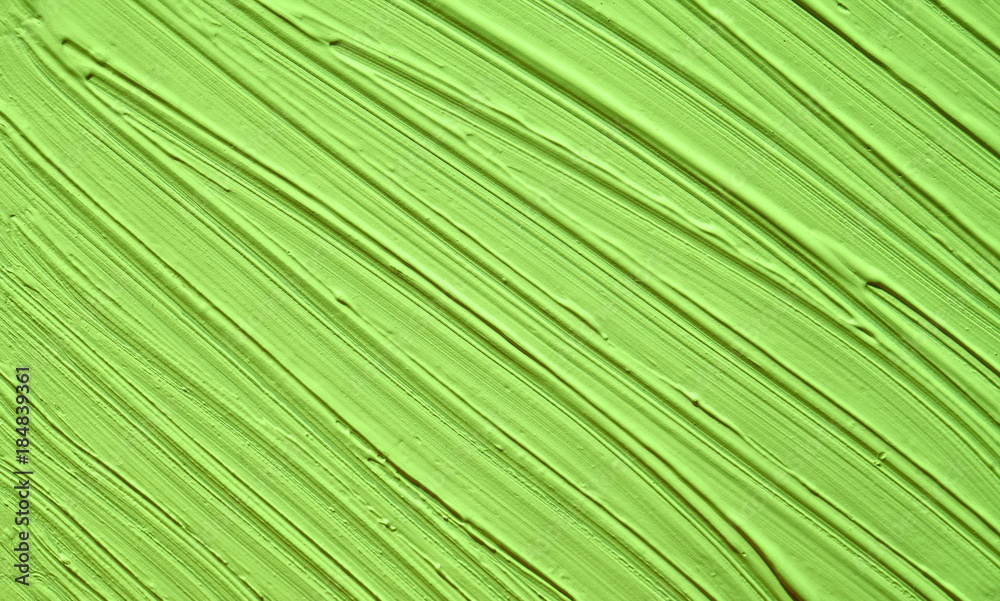 Background of green natural color with stripes texture. The fashionable color of 2018 is golden lime. Background of green natural color with stripes texture. The fashionable color of 2018 is golden lime.