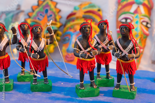 Clay made tribal dolls, terracotta handicrafts on display. photo