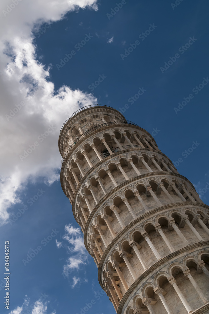 The Leaning Tower of Pisa with a cloud above, Tuscany, Italy