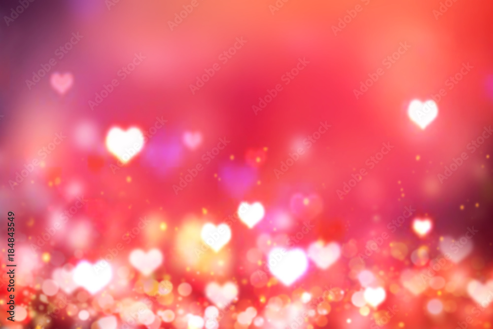 Glowing blurred hearts red background.Valentine's backdrop.