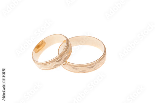 Golden wedding rings, isolated on white