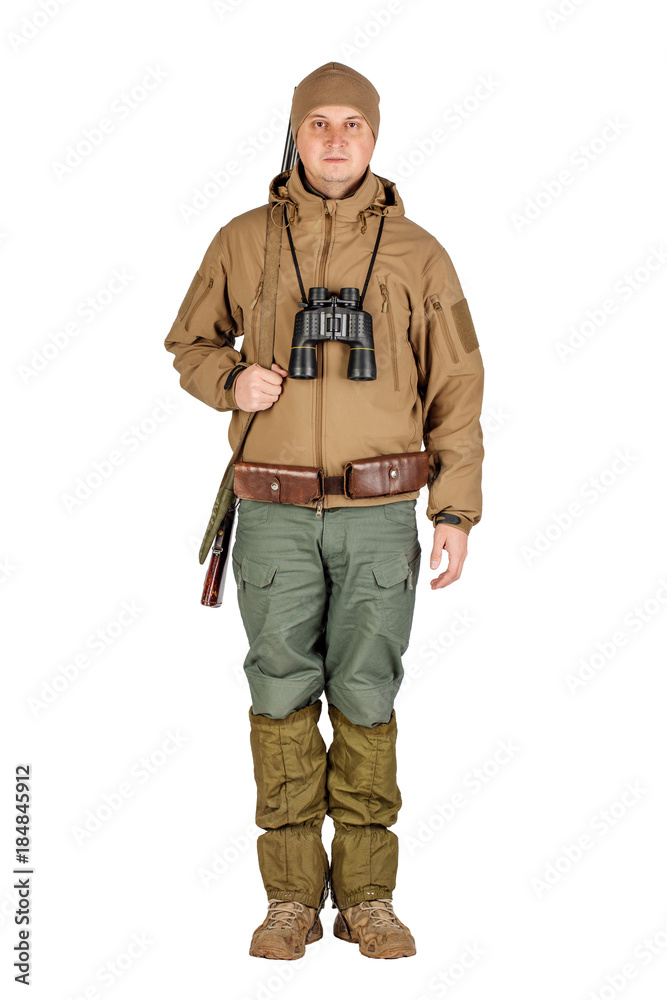 male hunter with double barreled shotgun male hunter with double barreled shotgun