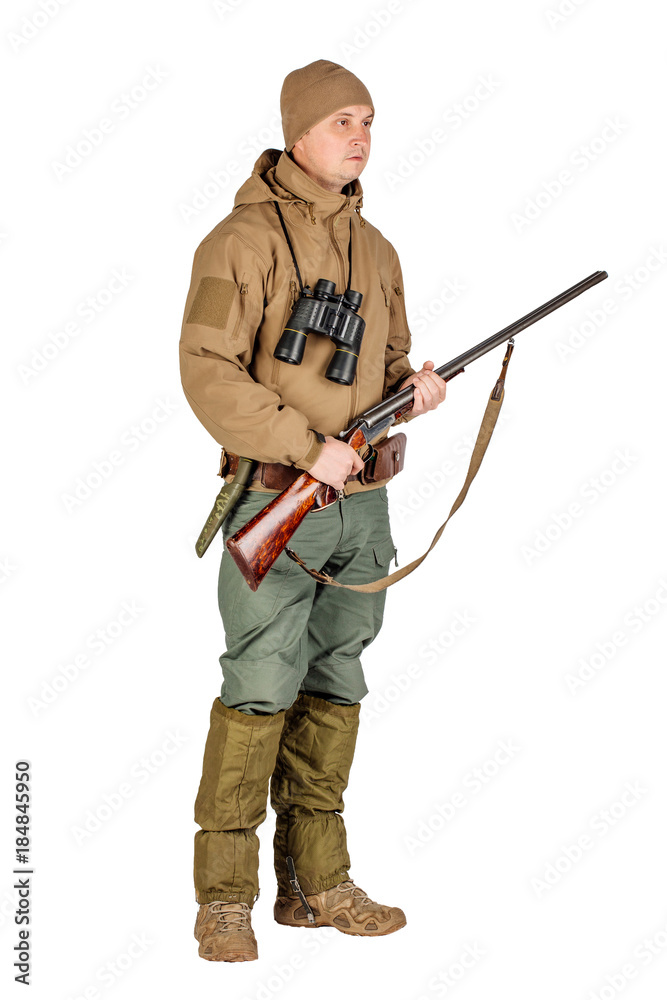male hunter with double barreled shotgun male hunter with double barreled shotgun