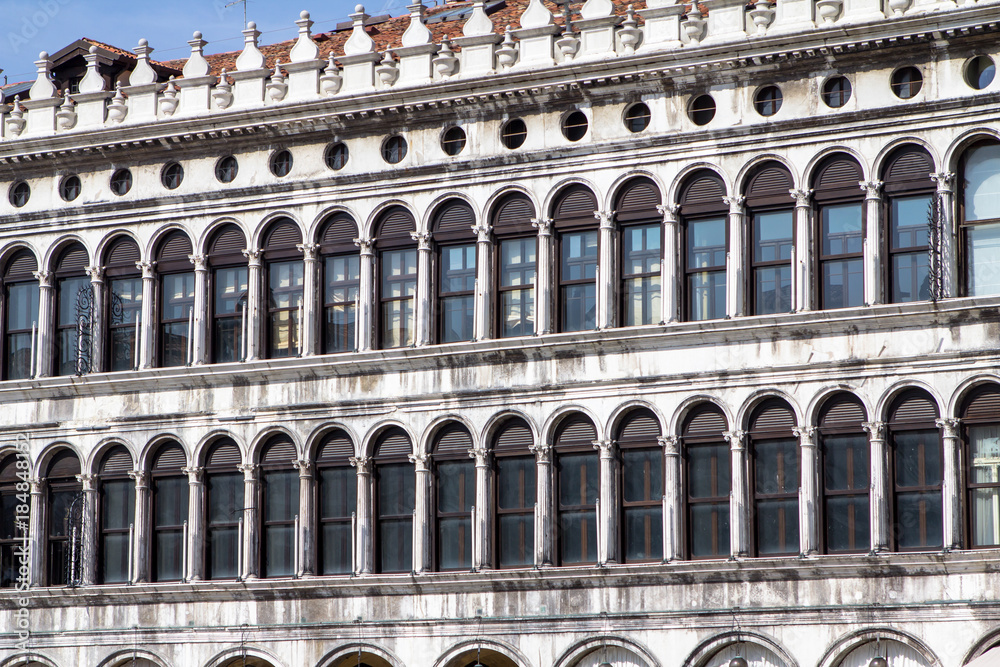 Arcades of the facade on Piazza San Marco in Venice, Italy