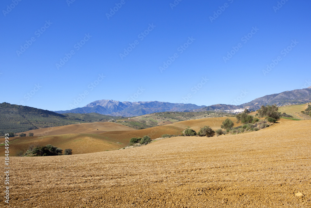 mountains and plow soil