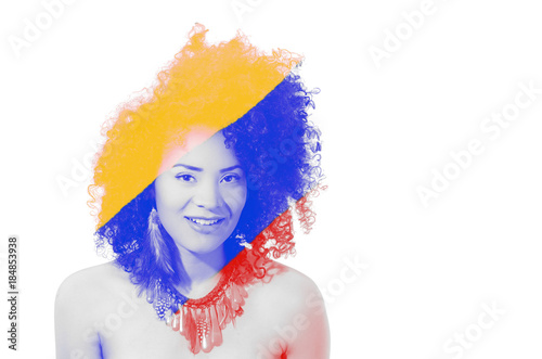 Close up of a smiling beautiful african american girl with an afro hairstyle, with doble exposure od the color of the ecuadorian flag, yellow, blue and red in her head, in a white background photo