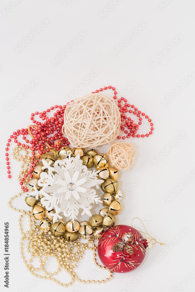 Christmas gift box with ribbon bow and ball toy and cone on white wooden vintage background Christmas gift box with ribbon bow and ball toy and cone on white wooden vintage background