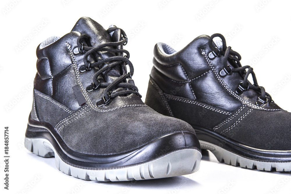 Working shoes with steel plate to protect toes on white Working shoes with steel plate to protect toes on white