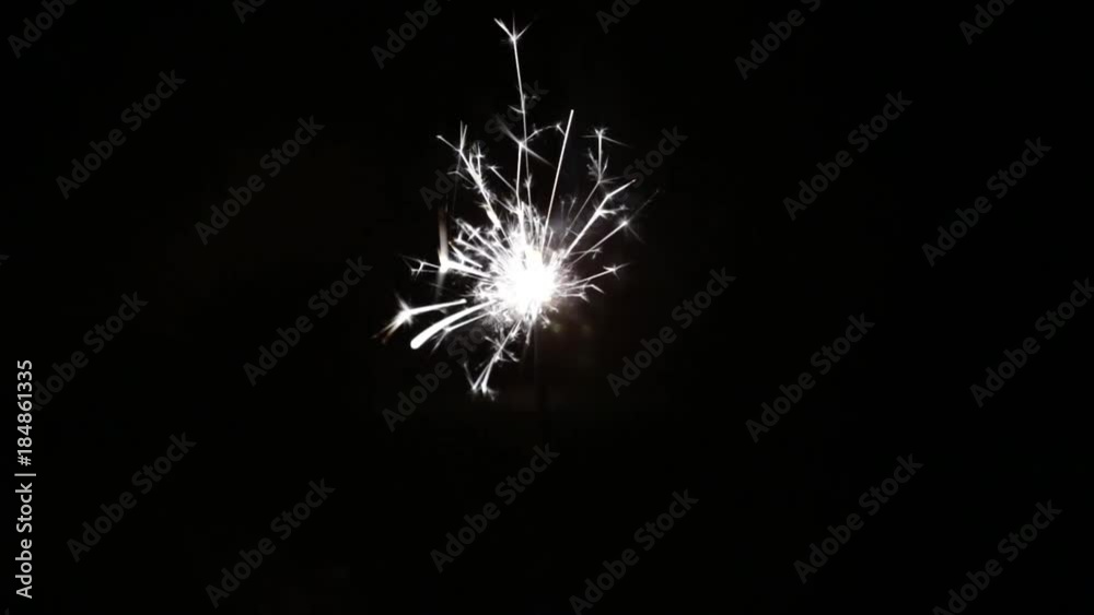 Bengal lights are burning on a dark background. Bengal lights are burning on a dark background.