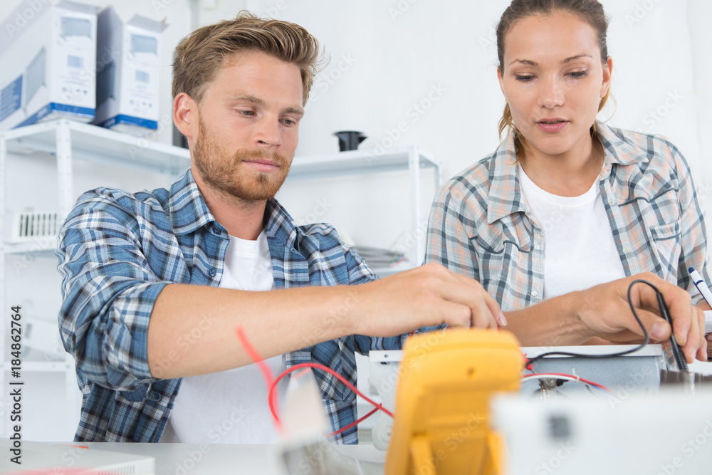Obraz premium portrait of male and female workers selective focus