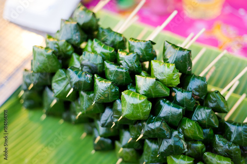 Thai snack betel leaf skewers