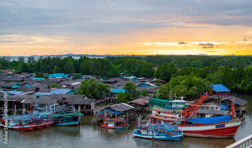 Fishing village on the river in rural Thailand.