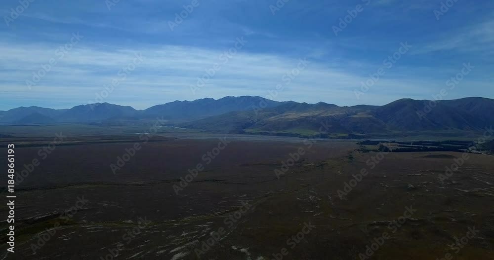 NEW ZEALAND – MARCH 2016 : Aerial shot over amazing landscape in Mount Cook National Park on a beautiful day NEW ZEALAND – MARCH 2016 : Aerial shot over amazing landscape in Mount Cook National Park on a beautiful day
