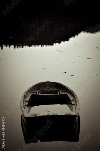 Slika na platnu Boat about to Sink in the Middle of a Lake