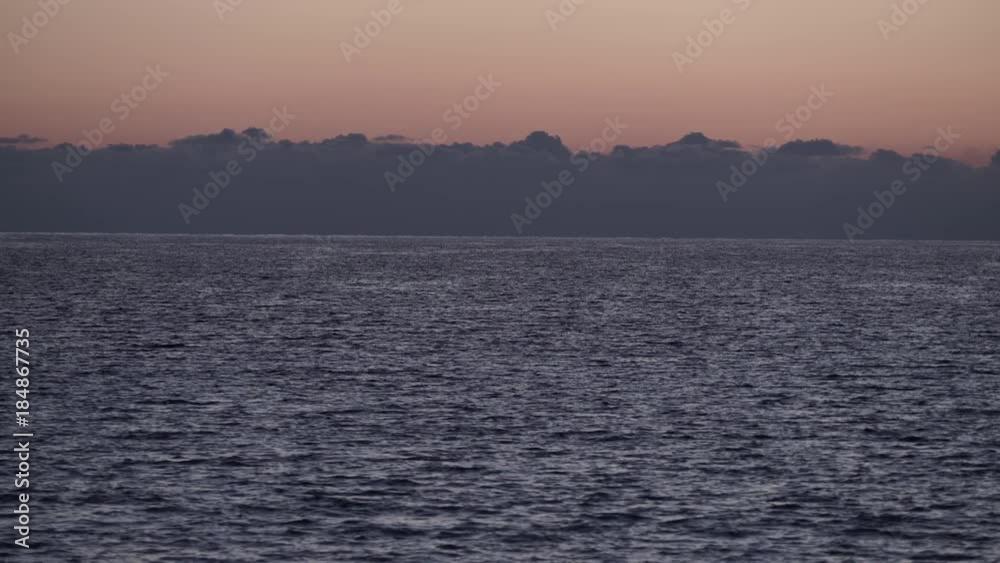 Sky after sunset over sea water surface, Greece Peloponnese Sky after sunset over sea water surface, Greece Peloponnese