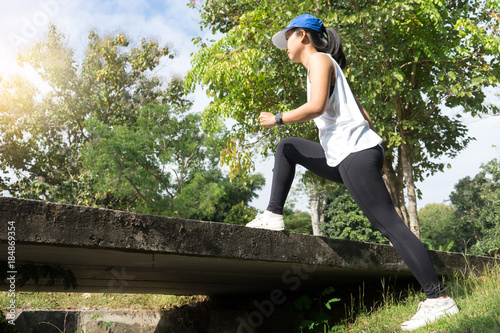 woman man prepare for exercise warm up body leg berfore sport jogging photo