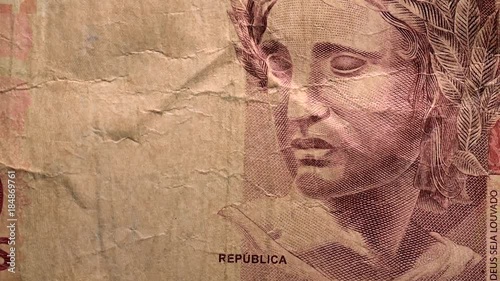 Wallpaper Mural Sliding motion of a 10 Reais bill money note, Brazilian Currency, full frame, closeup macro Torontodigital.ca