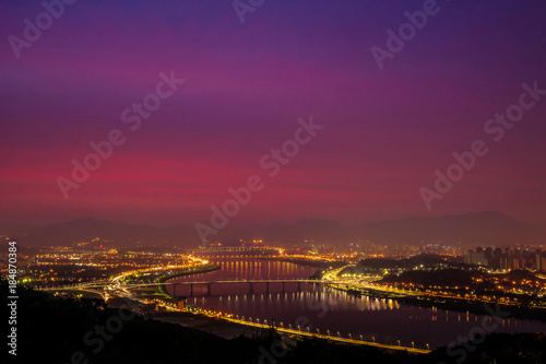 It is a night view before the sun of Mount Achas which is famous for the sunrise of Seoul New Year is bright.