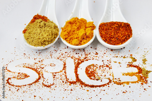 Fototapeta Naklejka Na Ścianę i Meble -  Colorful spices with text spice